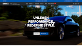 Website homepage with car and automotive products on a scenic road background